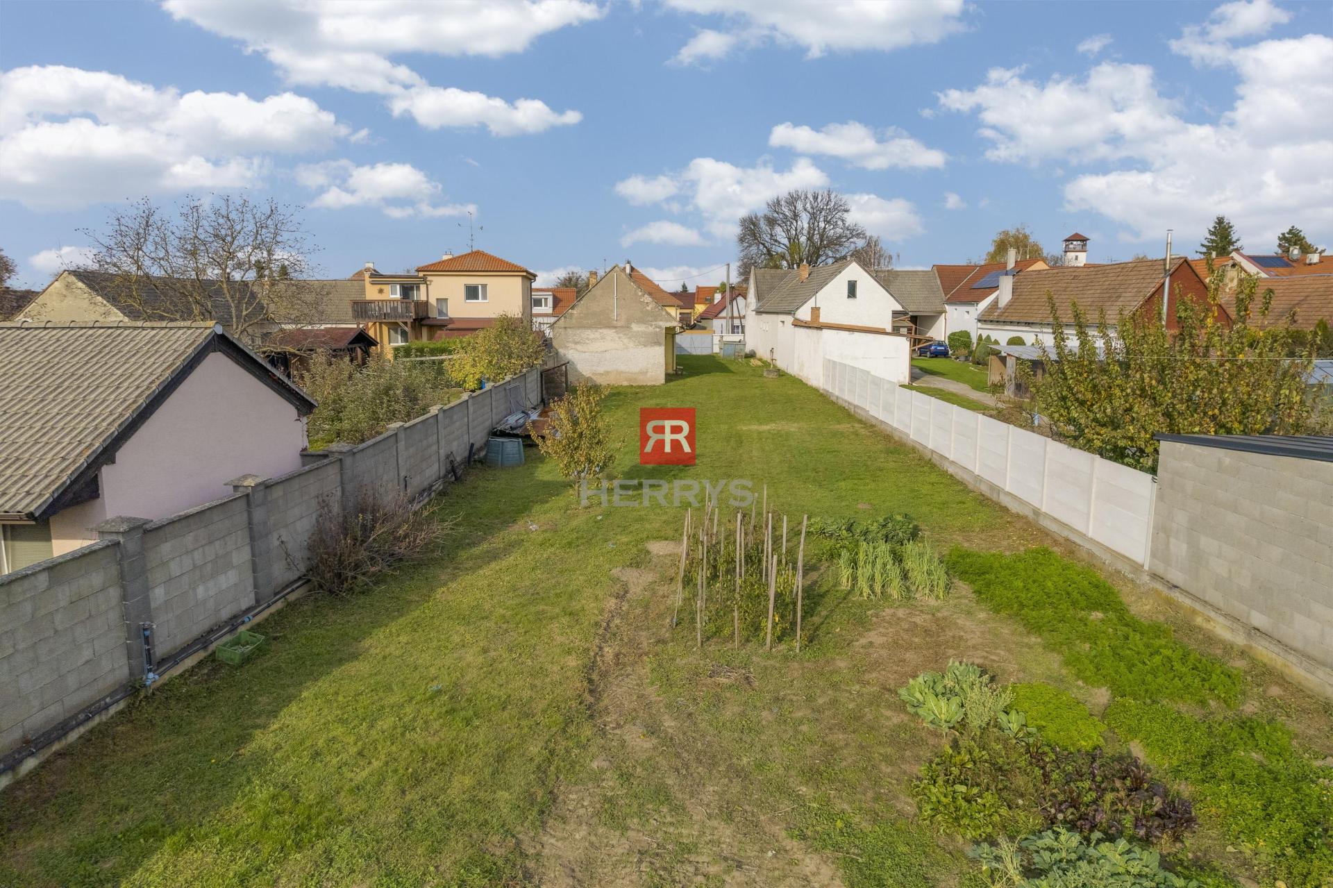 HERRYS - sale of lucrative land in the center of Lozorno 1697 m2. Access from both sides.