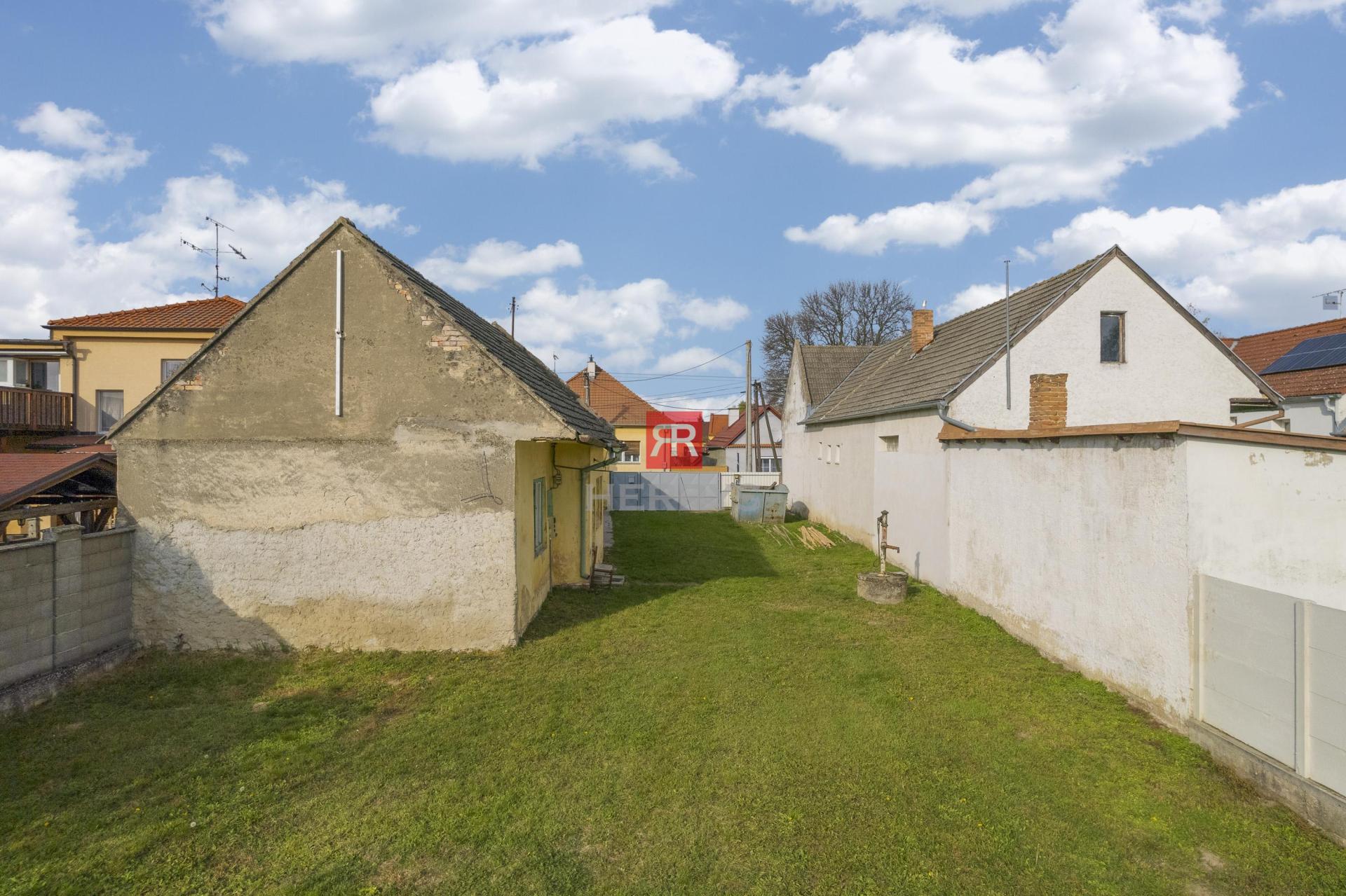 HERRYS - sale of lucrative land in the center of Lozorno 1697 m2. Access from both sides.