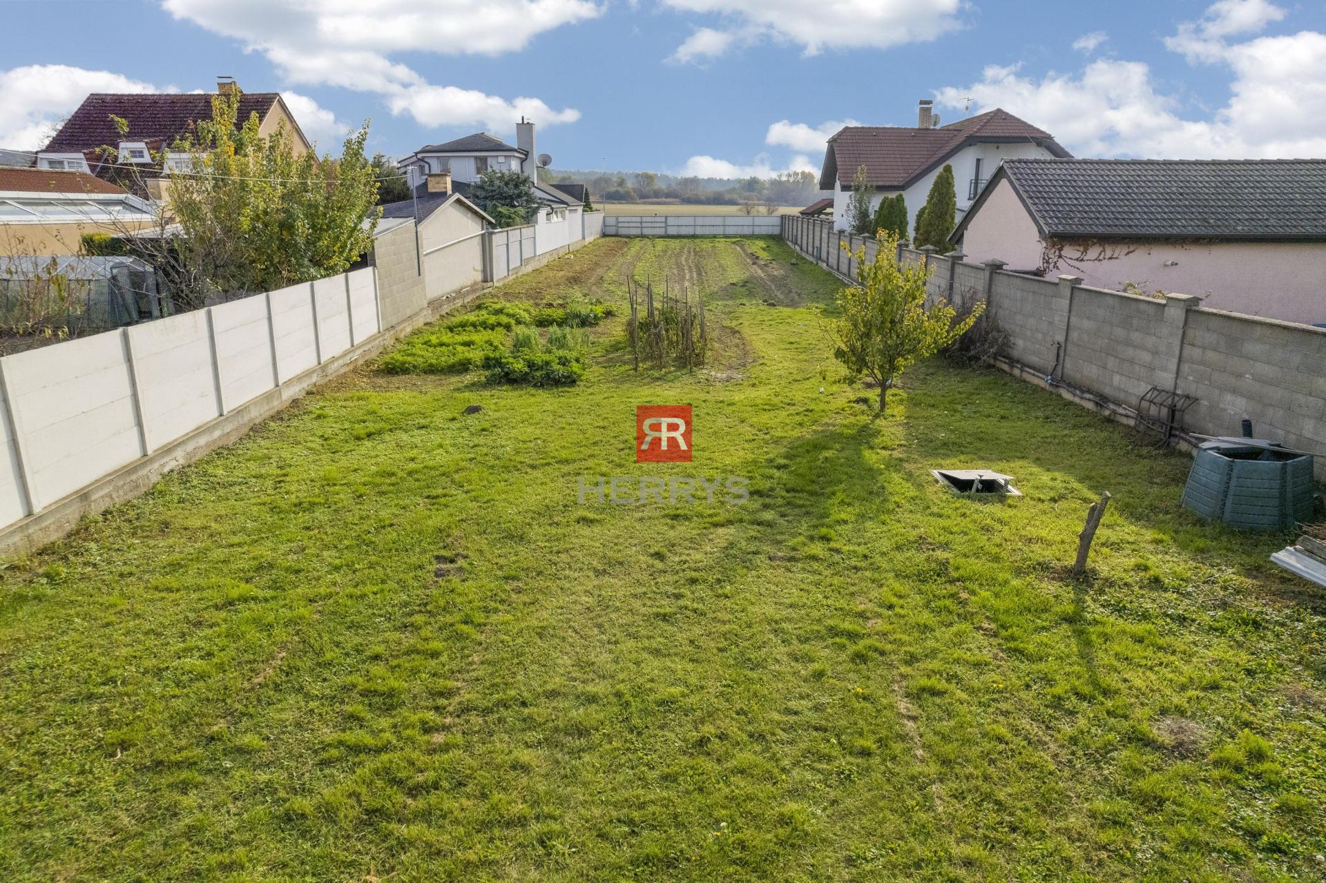 HERRYS - sale of lucrative land in the center of Lozorno 1697 m2. Access from both sides.